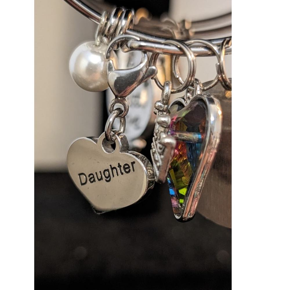 Three Silver Tone Bangle Style Bracelets - image 2